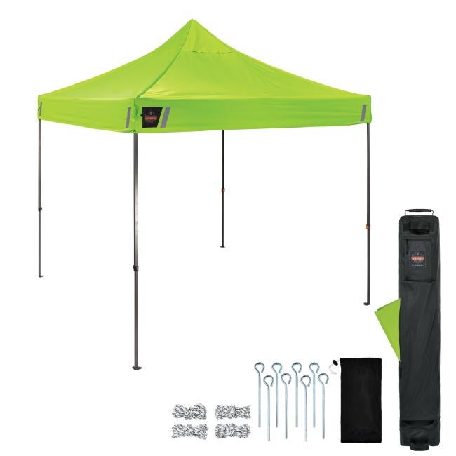 Fully assembled tent is shown with the frame and canopy in place. Accessories are displayed nearby, including the storage bag, canopy top, ropes, stakes, and stake bag .